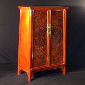 cabinet with walnut burl doors