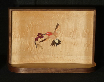 Wall hanging with hummingbird