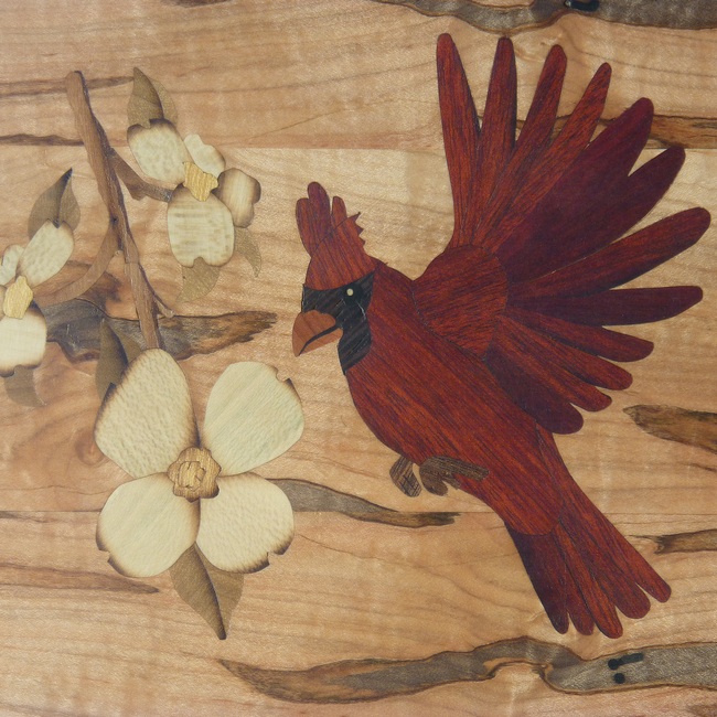 Picture with cardinal and dogwood flowers