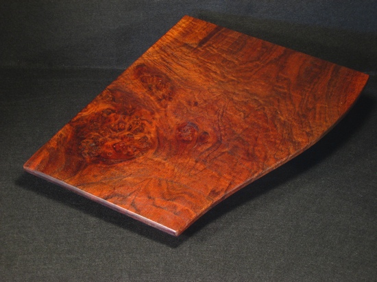 T27 - tray of walnut burl on black risers